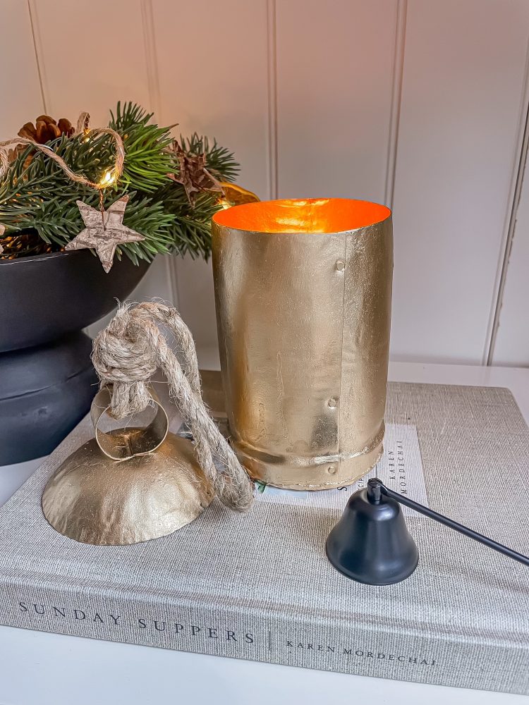 ANTIQUE COWBELL VESSEL