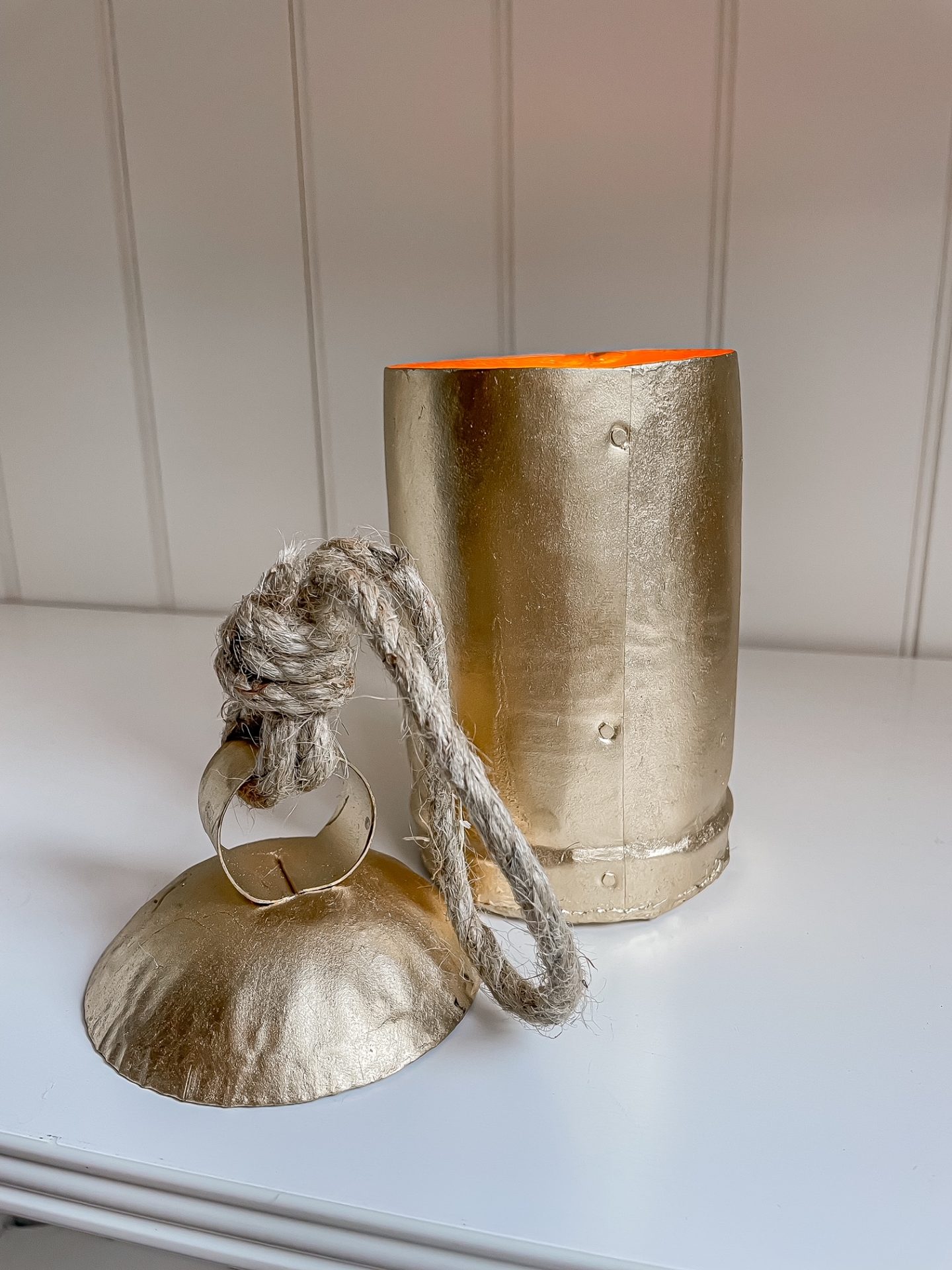 ANTIQUE COWBELL VESSEL